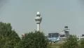 Control tower with a plane taking off HD Footage