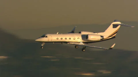 Control tower side view of executive jet preparing to land Stock Footage 59478672