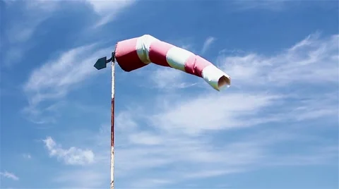 The control of a wind direction, windsock inflated by the wind on the cloudy sky 스톡 동영상 56647619