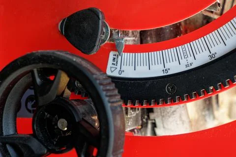 Controling and regulating red electrical table saw Stock Photos