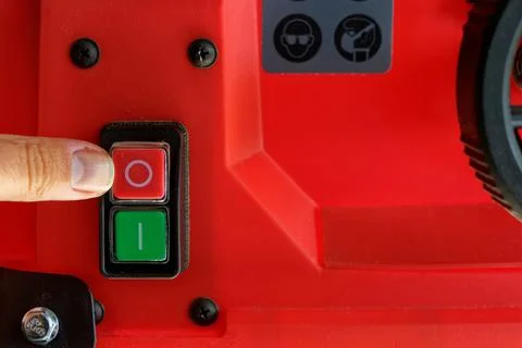 Controling and regulating red electrical table saw Stock Photos