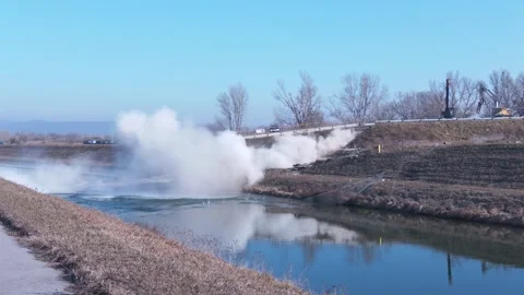 Controlled Bridge Demolition Explosion From Alternate Angle Stock Footage 342019052