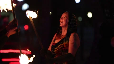 Controlled Burn Street Performers with Shallow Depth of Field - 02 Stock Footage 200812436