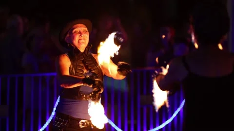 Controlled Burn Street Performers with Shallow Depth of Field - 03 Stock Footage 200812830