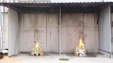 Controlled Fire Burning Flammable Materials for Training Stock Footage 301052385
