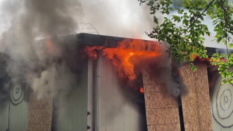 Controlled fire for fire training purposes Stock Footage 253396665