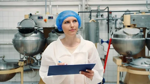 Controller checking confection factory. Stock Footage 98088303