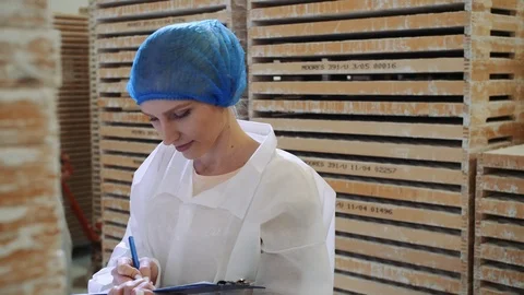 Controller checking factory storage room. Stock Footage 98028117