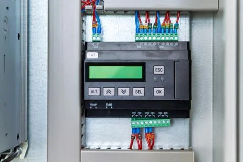 Controller or logic control relay in electrical Cabinet. Stock Photos
