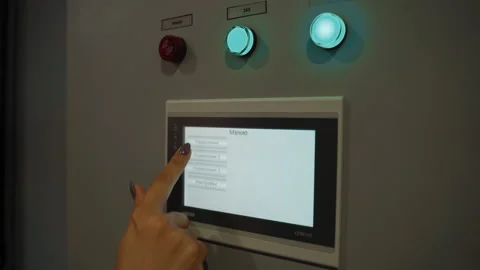 Controller switch on lights on manufacturing machinery Stock Footage 150902276