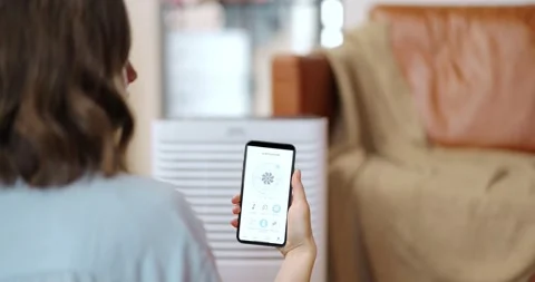 Controlling conditioning with a smartphone Stock Footage 149273609