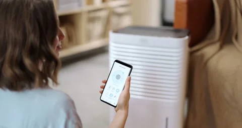 Controlling conditioning with a smartphone Stock Footage 149273638