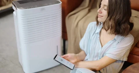 Controlling conditioning with a smartphone Stock Footage 149273643