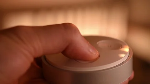 Controlling dimming smart home light system with a remote Video stock 98461377