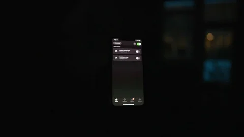 Controlling home lights wirelessly using smartphone / Smart Home Features Stock-Footage 103185011