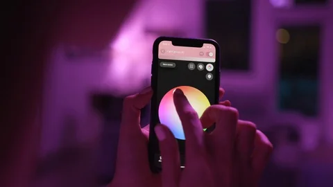 Controlling home lights wirelessly using smartphone / Smart Home Features 스톡 동영상 103185302