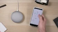 Controlling A Smart Home Assistant With A Smartphone Device Stock Footage