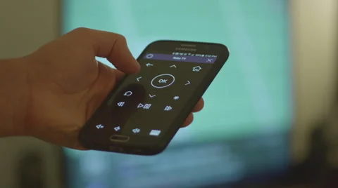 Controlling TV with Smart Phone 스톡 동영상 57330361