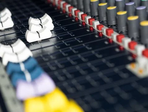 Controls on audio mixer close up 库存照片