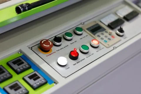 Controls on the dashboard of industrial machine Stock Photos