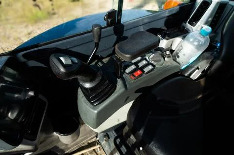 Controls of a small excavator in the cab. Background for special equipment theme Stock Photos
