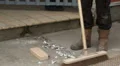 Contruction worker with broom HD Footage