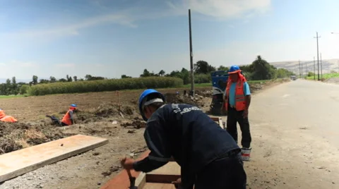 Contruction Workers at Work, Building , Digging and Working in Rural Town Stock Footage 49822310
