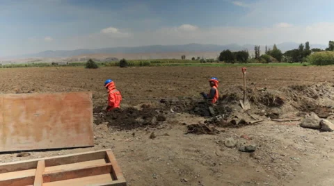 Contruction Workers at Work, Building , Digging and Working in Rural Town Stock Footage 49822436