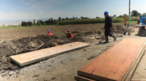 Contruction Workers at Work, Building , Digging and Working in Rural Town Video stock 49822629