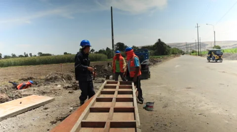 Contruction Workers at Work, Building , Digging and Working in Rural Town Stock Footage 49822638