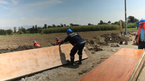 Contruction Workers at Work, Building , Digging and Working in Rural Town Stock Footage 49822656