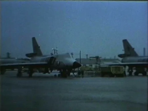 A Convair F-102 Delta Dagger warplane is flown, in the rain, during the William Video stock 75071998