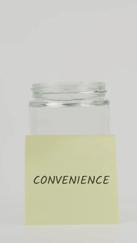 Convenience text or word on yellow sticky note attached to glass jar Stock Footage 311699295