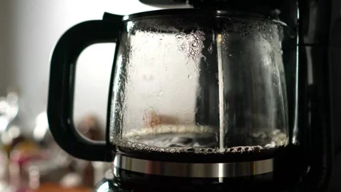 Convenient coffee maker drink coffee maker caffeine filter black making in 4k Video stock 336585324