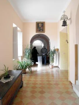 Convent corridor with bell Foto stock