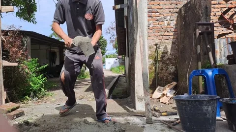 The conventional contractor is plastering walls. Stock Footage 237238812