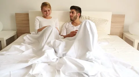 Conversation in Bed Stock Footage 39970525