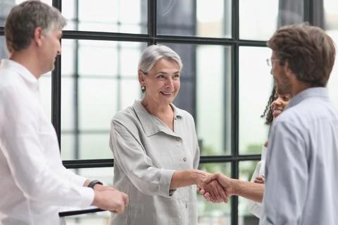Conversation between managers and employees in the office Stock Photos
