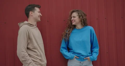 A conversation between two friends on the street. Stock Footage 273365962