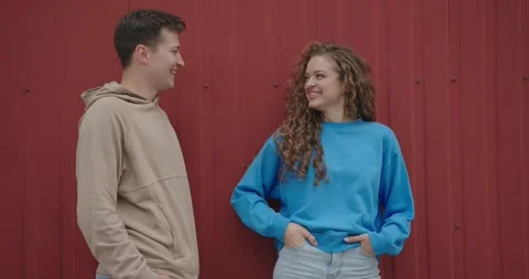 A conversation between two friends on the street. Video stock 273366371