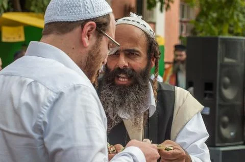 Conversation between two Hasidic Jews. Stock Photos