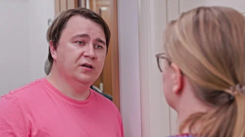 Conversation in hallway: casual interaction between friends leading to surprised Stock Footage 308811624