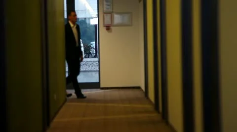 Conversation of nice couple on sofa in a lobby of the hotel Stock Footage 27843826