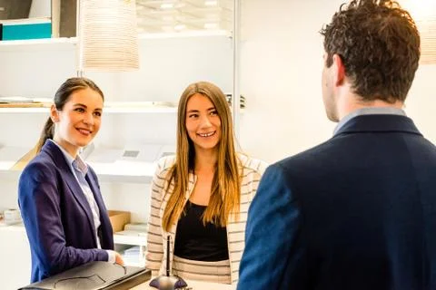 Conversation at the office reception Stock Photos