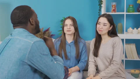 Conversations in a friendly multi-ethnic atmosphere. Video stock 228801610