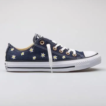 Converse Chuck Taylor All Star OX navy blue with flowers sneaker 스톡 사진