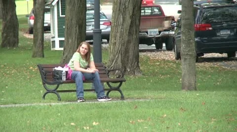Conversing on a park bench (4 of 4) Stock-Footage 16492856