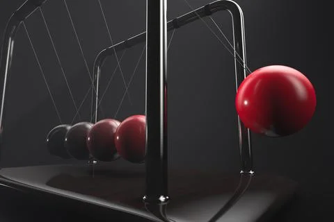 Conversion of kinetic energy into potential. Newton's cradle in action Foto stock