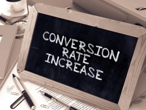 Conversion Rate Increase - Chalkboard with Hand Drawn Text Illustrazione stock
