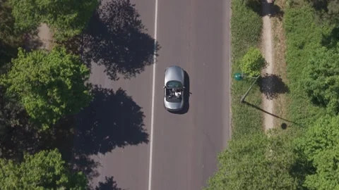 Convertible Car Top-Down Tracking Drone Ascending Reveal 動画素材 338046190